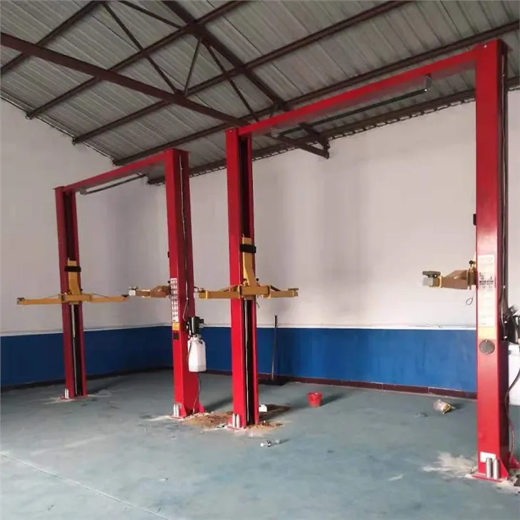 গাড়ি মেরামতের জন্য দুটি পোস্ট কার লিফট